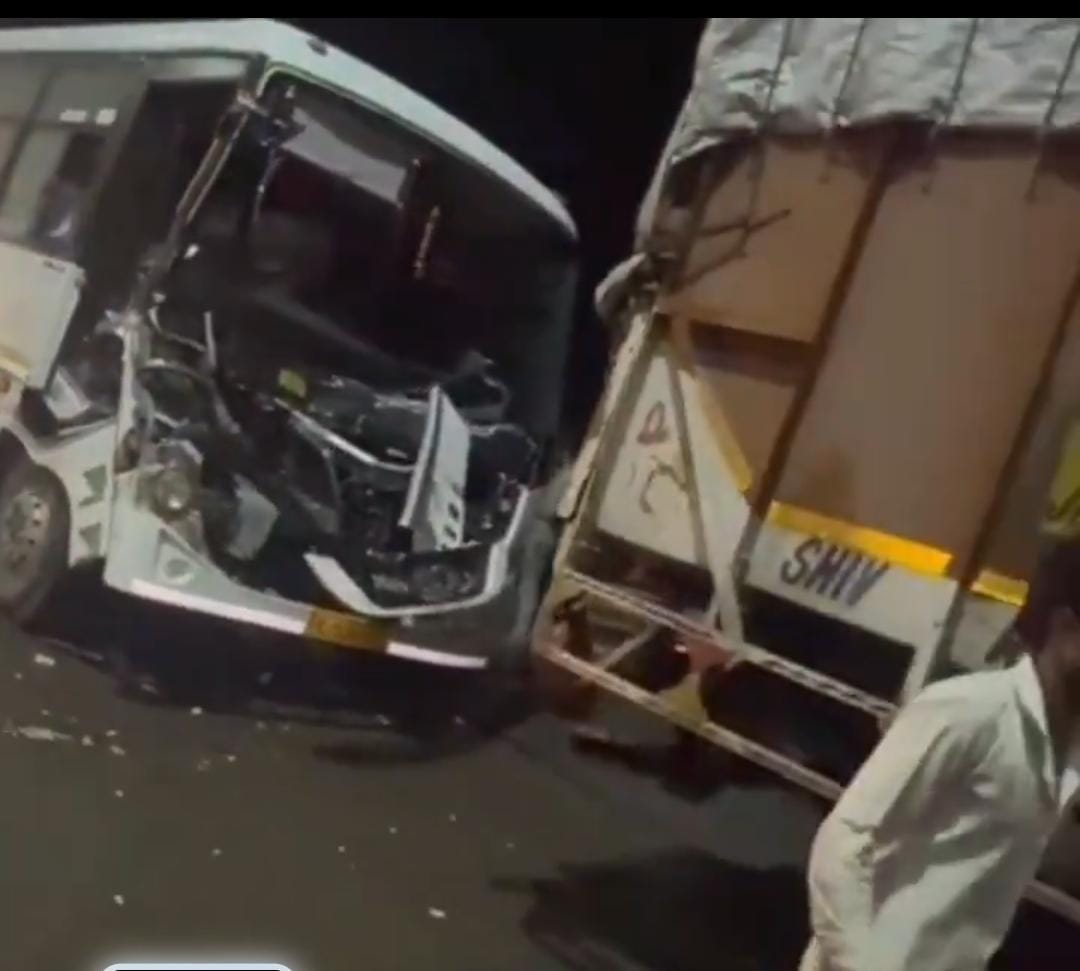 A bus full of passengers collided with a truck moving ahead of it.