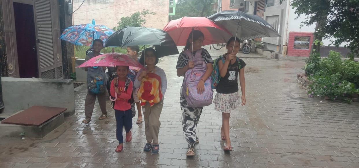 Rain brings district to a standstill all day; mercury drops by eight degrees.