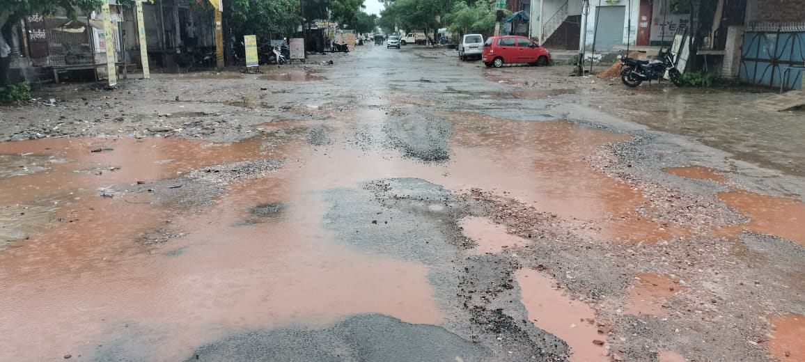 Crops flattened in fields after 36 hours of rain; farmers' anxiety mounts.
