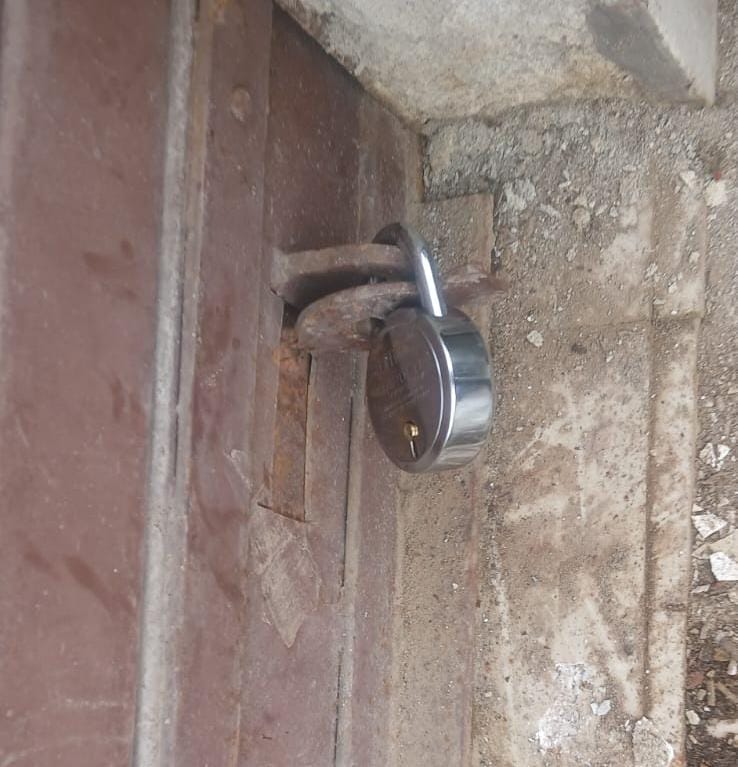 Attempt to take possession of shops sealed following High Court order; ADM orders an inquiry.