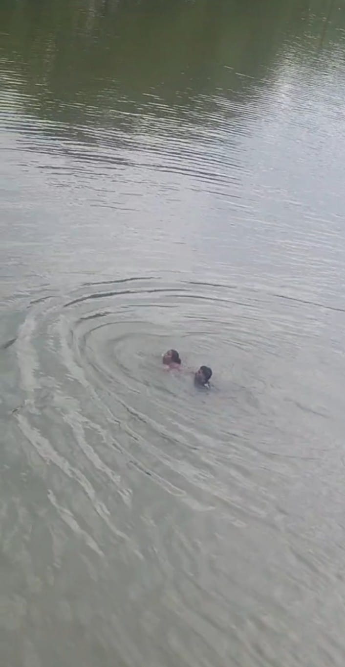Woman Arrives at River with Child to Jump In, Locals Rescue the Child; She Then Leaps into the River