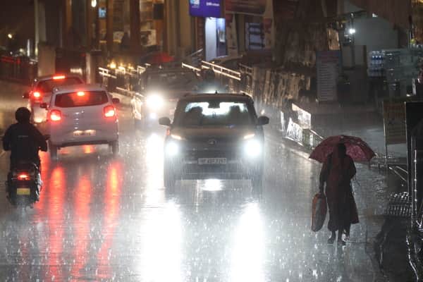 Rain lashed Dharamshala as evening fell; the mercury dropped to 13 degrees, and the chill intensified.