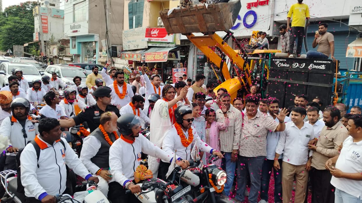 The BJP State President joined the journey riding a motorcycle.