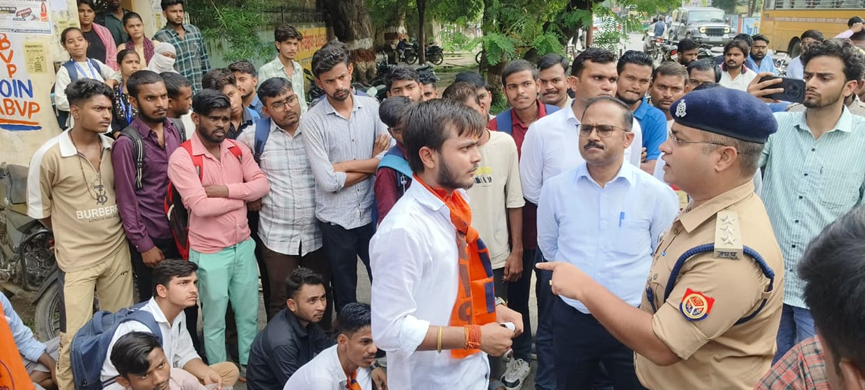 ABVP stages indefinite sit-in after DM fails to arrive.