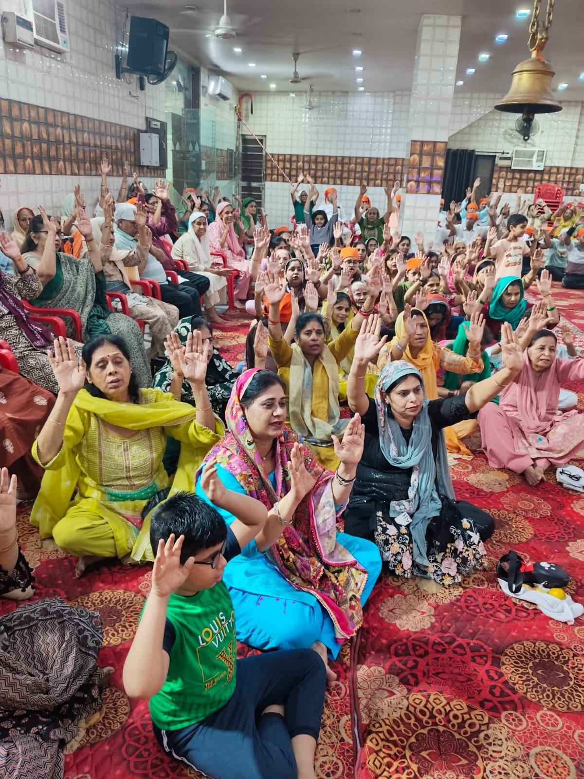 फोटो: सोनीपत के नंदवानी नगर स्थित श्री हनुमान मंदिर में आयोजित राम कथा के दौरान उपस्थित श्रद्ध