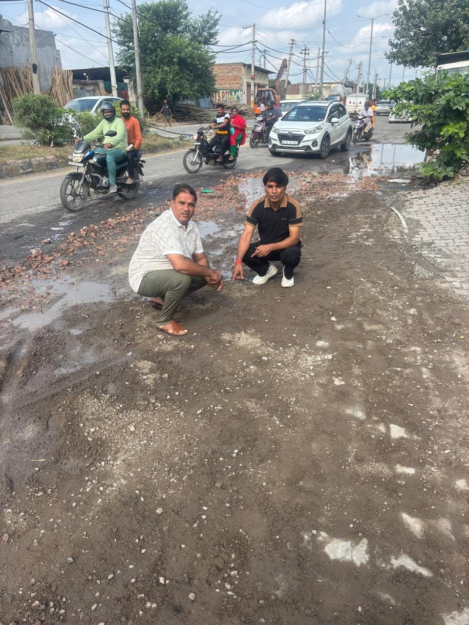 Questions raised over patchwork being done on water-filled potholes; demand for action.