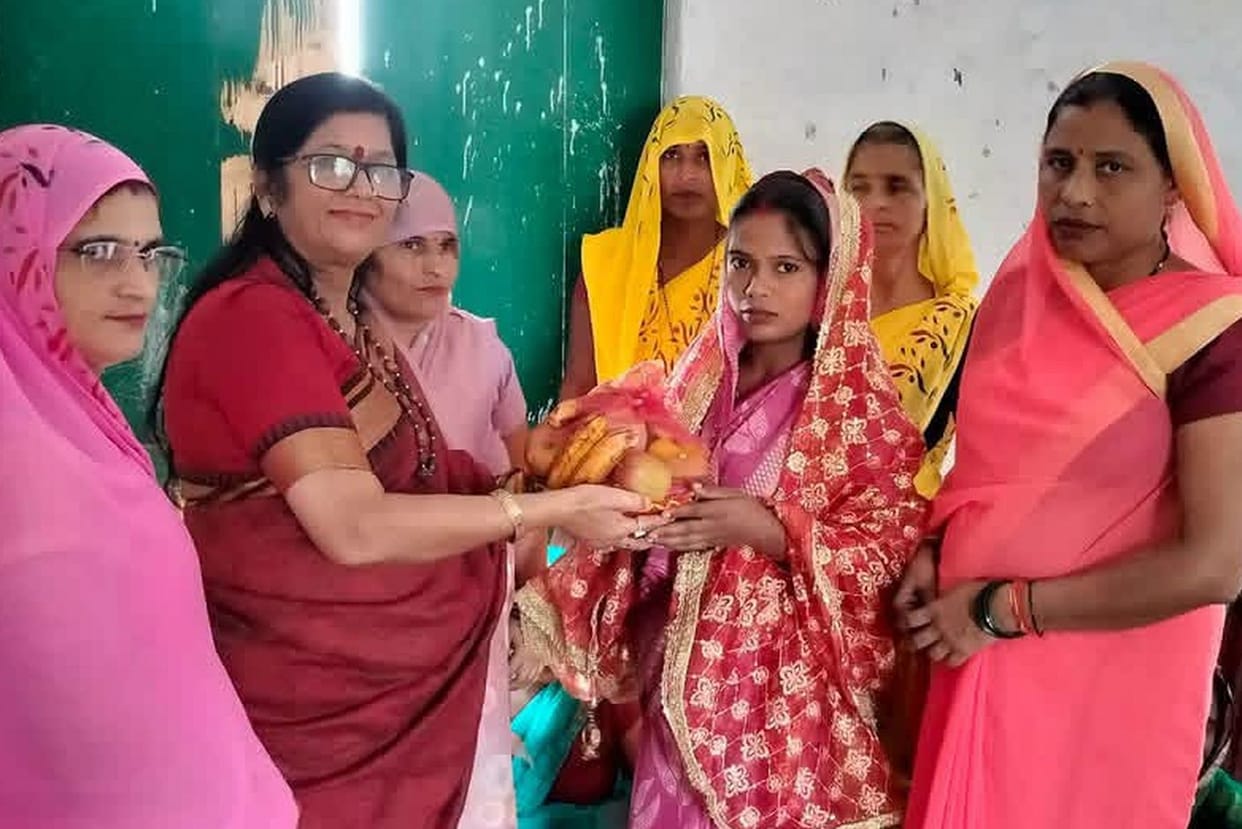 Self-help group women honored at the Aangan Utsav.