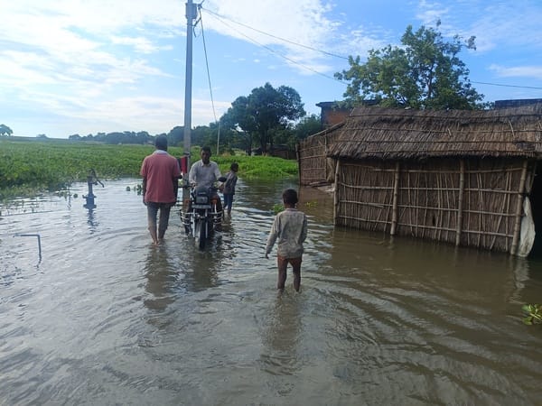 Waterlogging due to rain disrupts normal life.