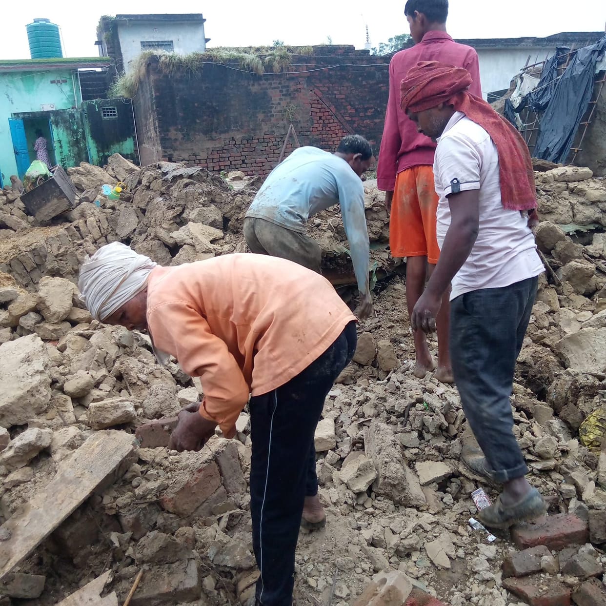 House roofs collapsed and paddy crops were destroyed in the rain.
