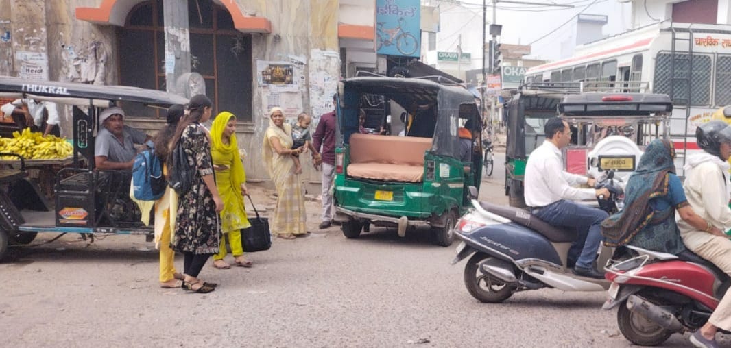 Roads have shrunk due to encroachment, parking is unavailable, and city residents are grappling with daily traffic jams.