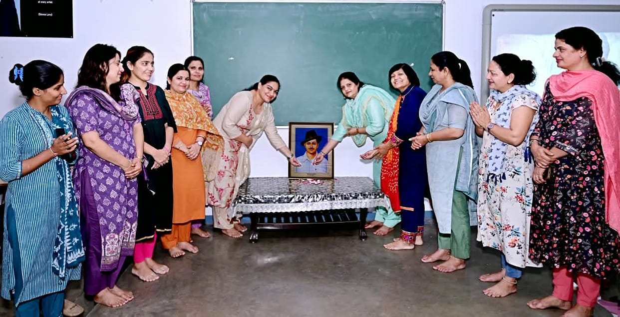 Female students watched a documentary on the birth anniversary of Shaheed Bhagat Singh.