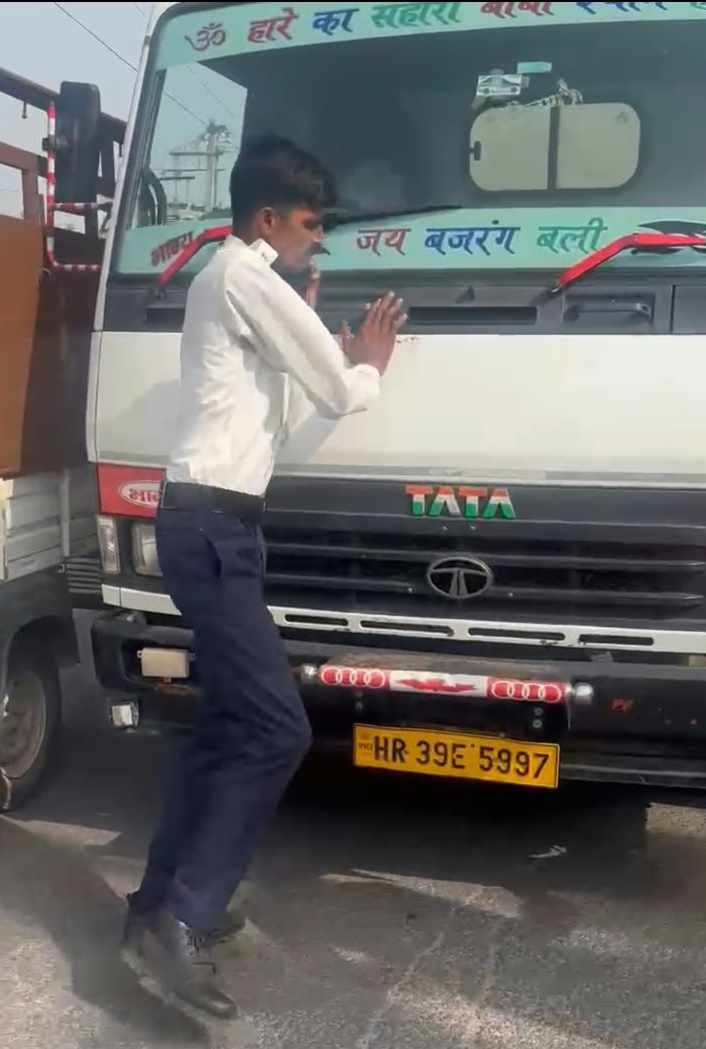 Canter driver enters 'No Entry' zone; accused of attempting to run over traffic police personnel who stopped him.