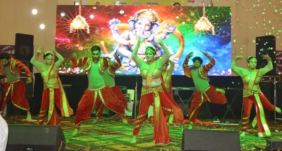 The audience was captivated by the musical performances accompanying the *Jhoola* (swing) dances; the festivities continued late into the night.
