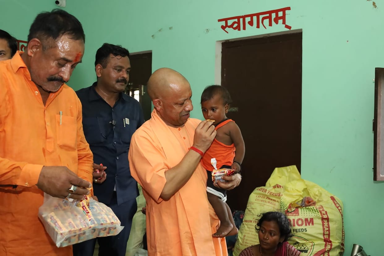 The Chief Minister visited flood victims and affectionately cradled Suhani in his arms.