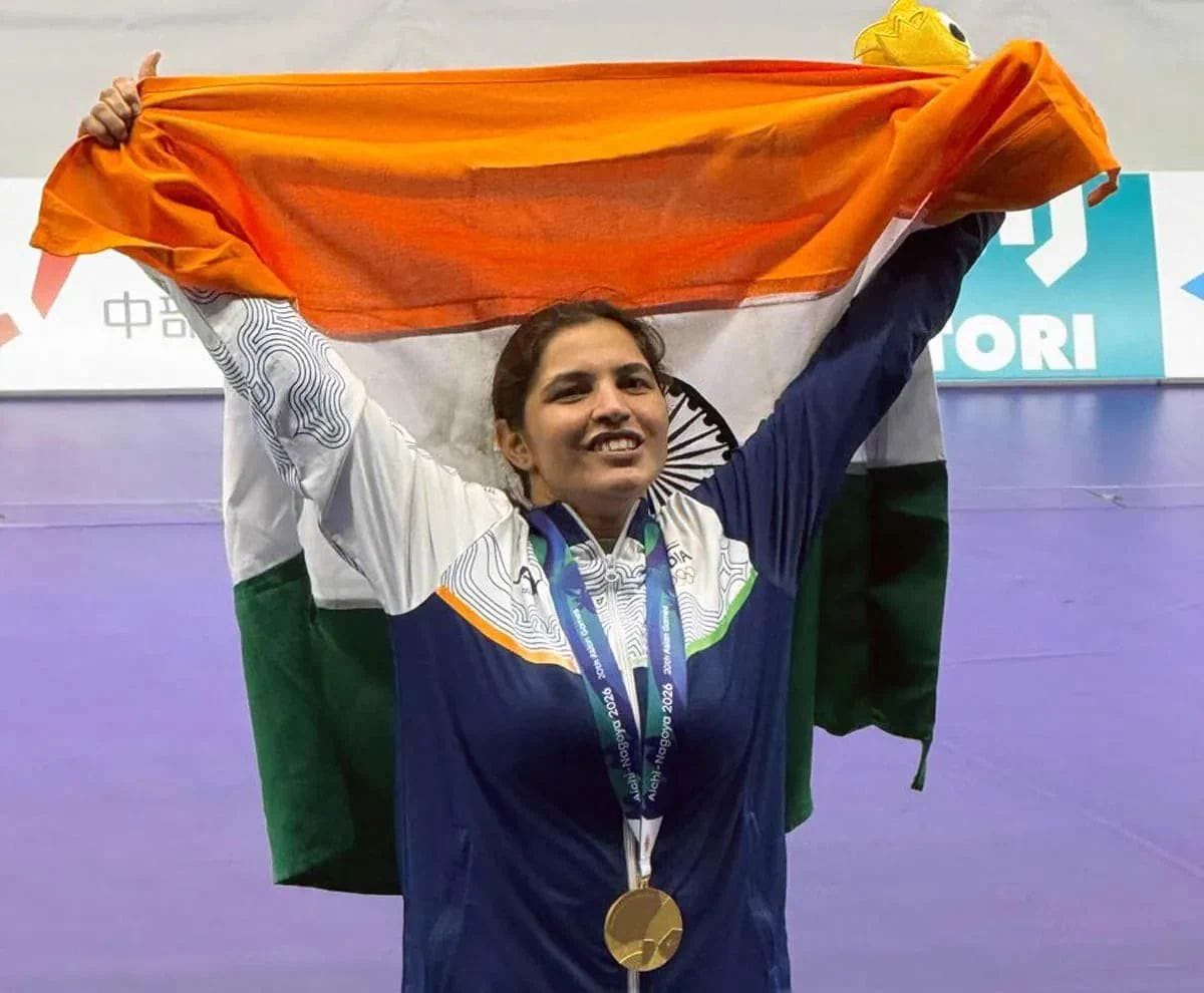 Mother moved to tears by daughter's second gold; says her chest swells with pride.