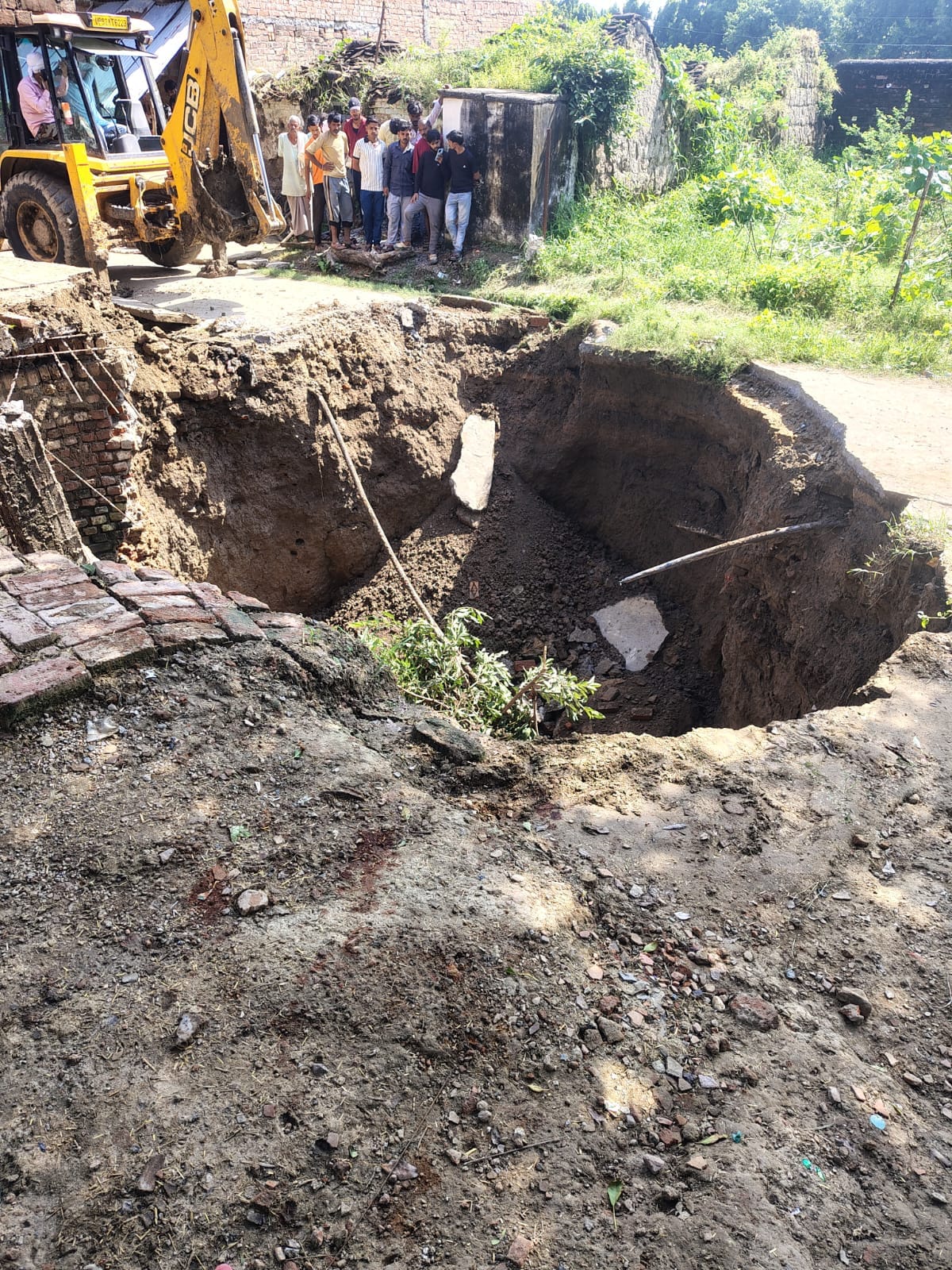 20-foot-deep pit increases risk of accidents.