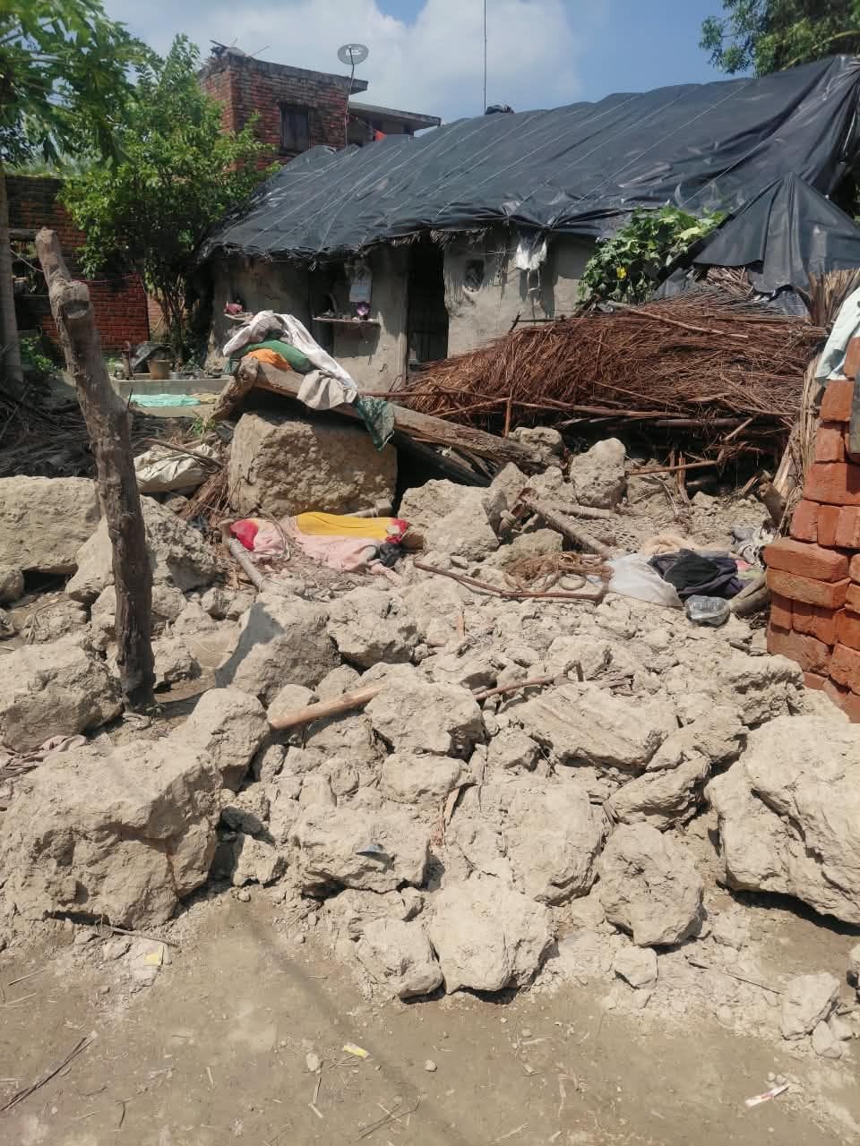 Elderly woman dies after being buried under debris from a collapsed wall