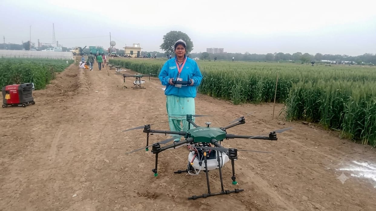 Lakshmi became self-reliant by flying drones over fields.