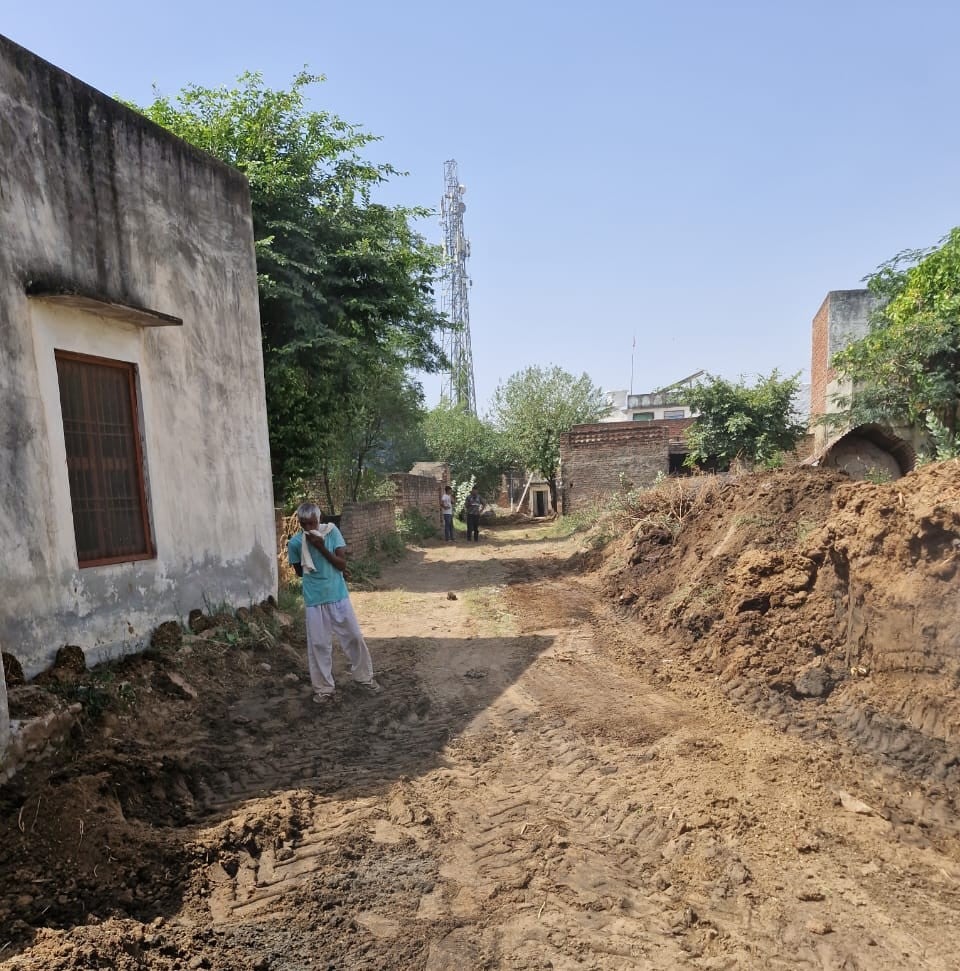The path in front of the house was cleared after removing an encroachment that had existed for a long time