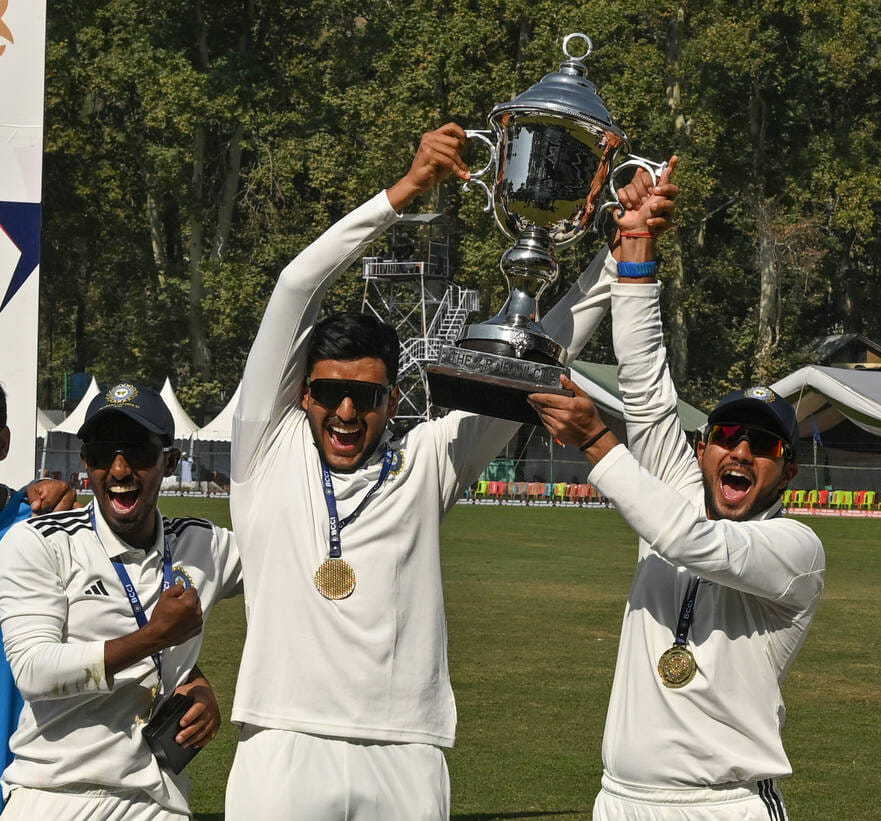Rest Of India players pose with Irani Cup after defeating Jammu and Kashmir by 167 runs.