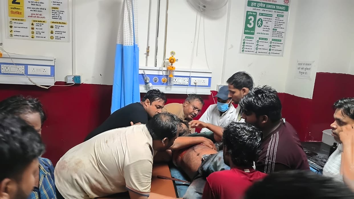 A bloody clash erupted over a land dispute, leaving a young man seriously injured after being stabbed.