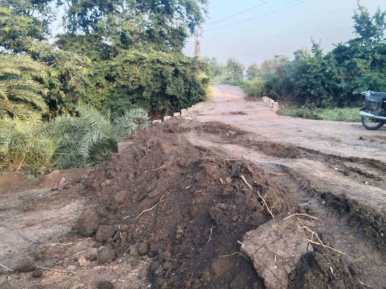 Villagers forced to repair dilapidated roads; potholes being filled using village development funds; villagers