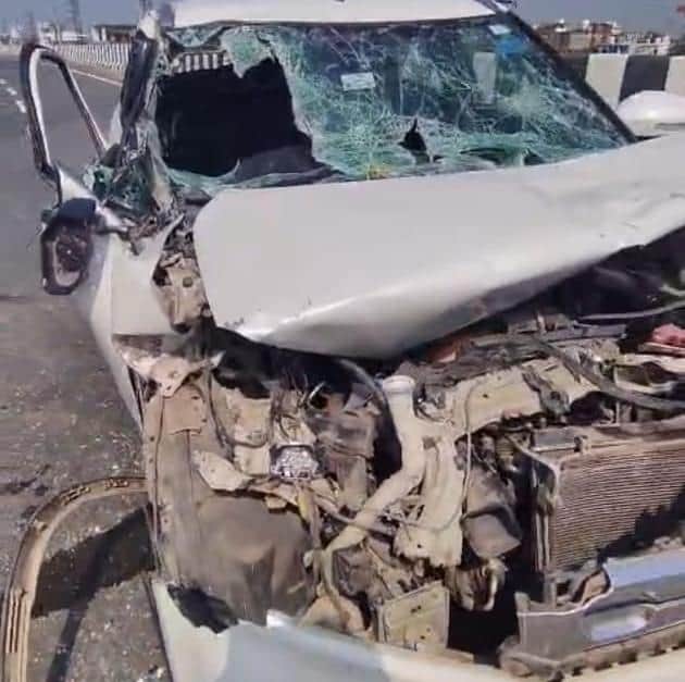 Truck runs over silver trader's car; two brothers injured.