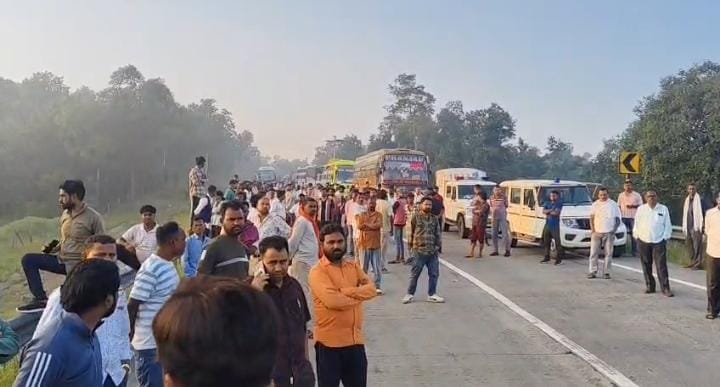 Two trailers collided at Madanpur Ghat around 2 AM, blocking NH for 10 hours; passengers suffered