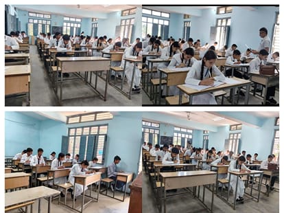 डंगार स्कूल में अंतरराष्ट्रीय गणित ओलंपियाड परीक्षा देते हुए विद्यार्थी। स्रोत: स्कूल प्रबंधन।