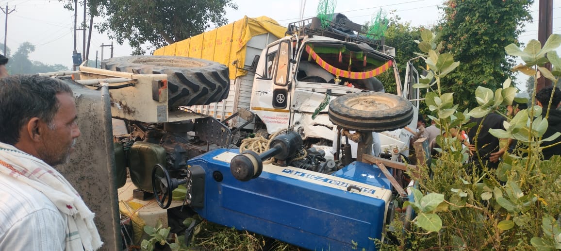 Canter truck rams into rear of paddy-laden tractor-trolley; four injured.