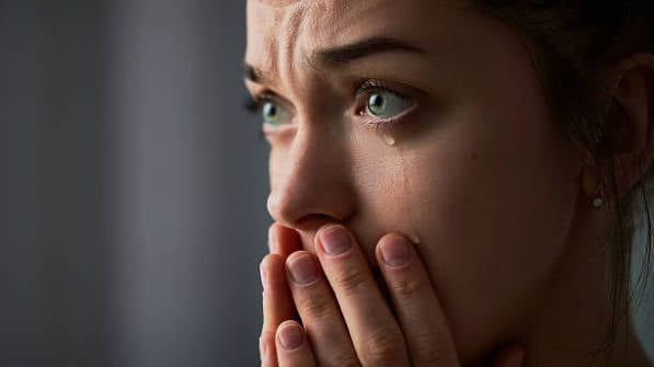 Husband dead, herself 80% burnt, worried about the children.
