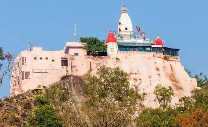 An *Akhand Jyoti* (perpetual flame) fueled by *desi ghee* has been burning in the sanctum of Maa Mantra Devi for 22 years.