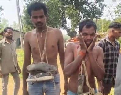 In Surajpur, villagers paraded two youths—accused of stealing a pump—while making them wear garlands of shoes.