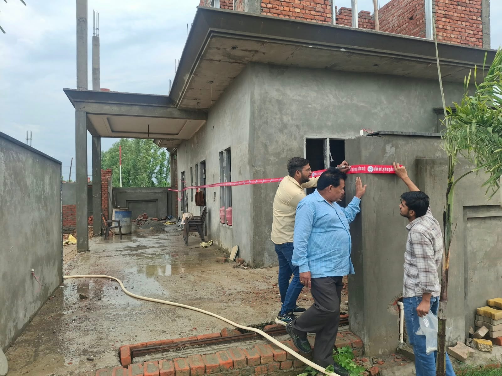 Bulldozers razed two colonies; one building was sealed.