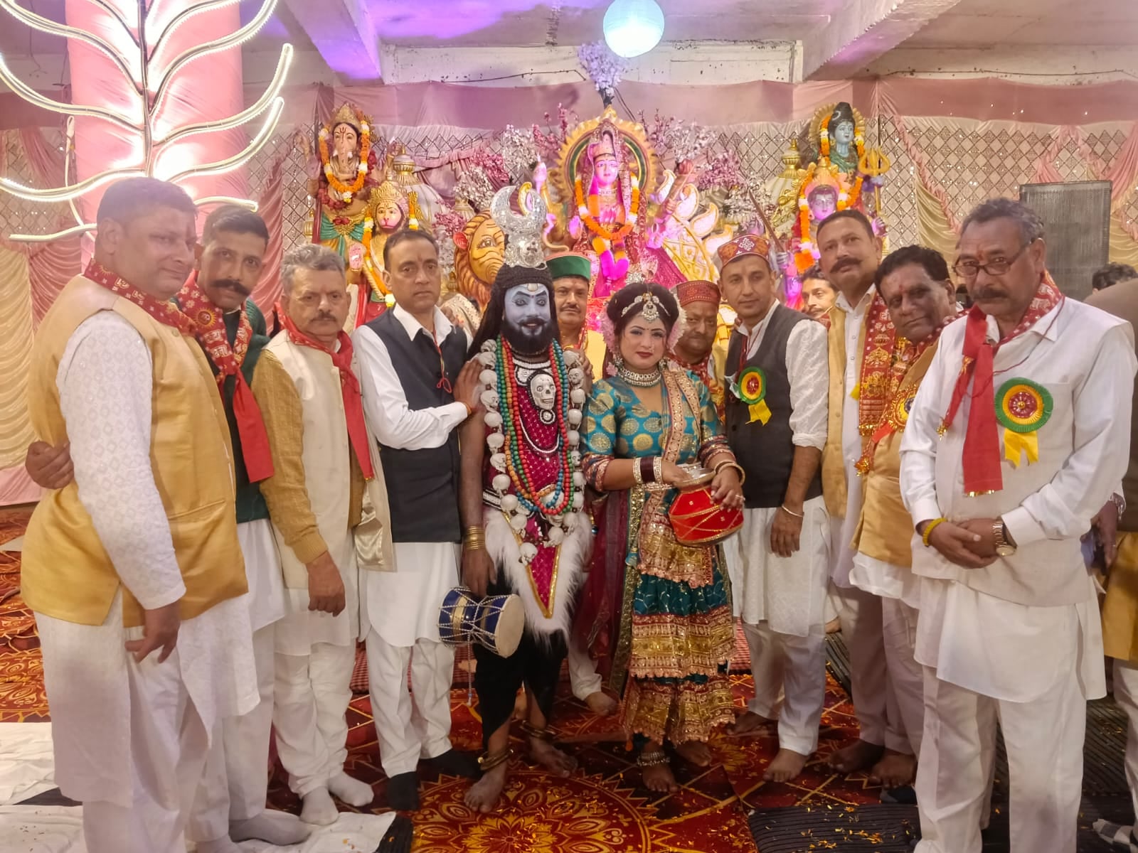 Devotees danced to devotional songs dedicated to the Mother Goddess.