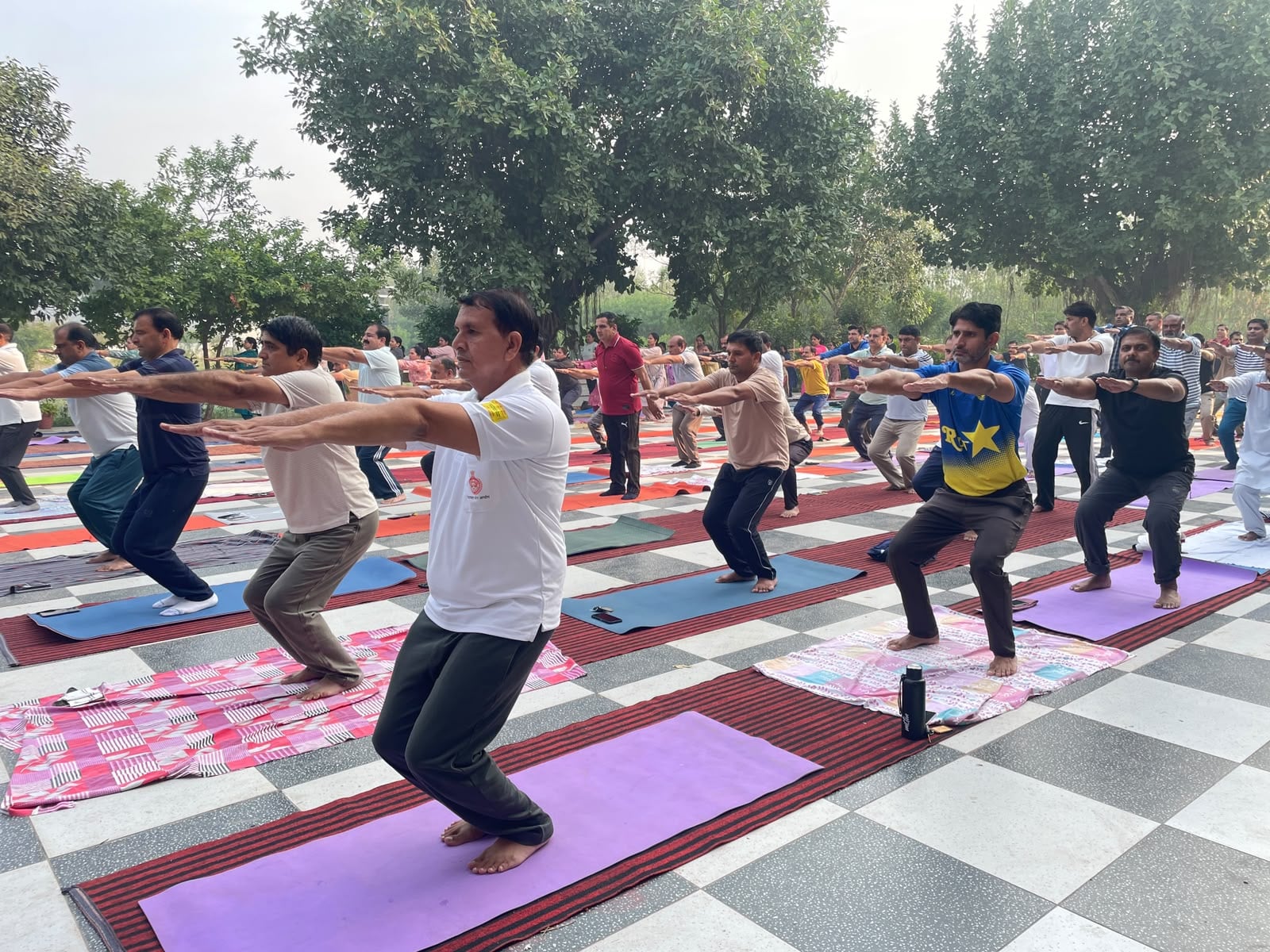 80 teachers will help children become healthy by learning the intricacies of yoga.