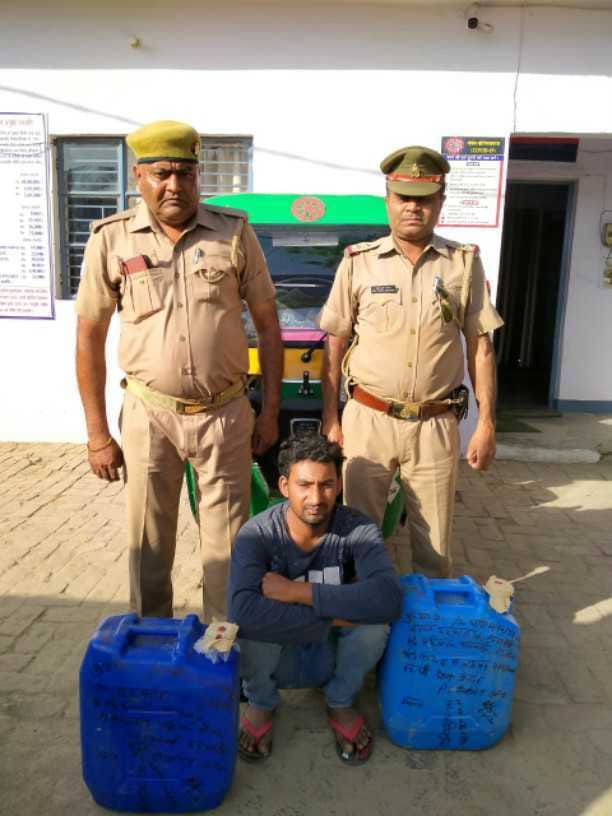 A smuggler caught carrying alcohol in an auto
