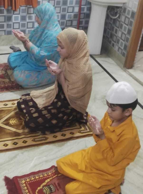 Muslim person worship at home on  Shabb e rat