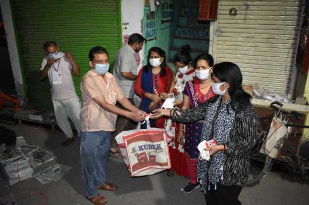 Amar Ujala and Udyog Vyapar Mandal women wing distribute mask and soap to newspaper vendors