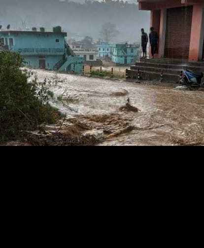 Due to torrential rains, the road to Mandalasera turned into a rainy stream