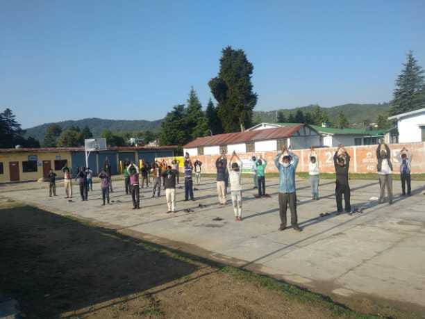 officers and labours do together yoga