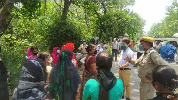 Women clamored again at the collectorate gate demanding more ration