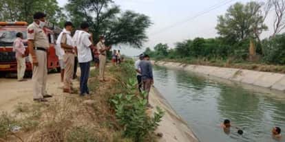 गांव कालाका के पास नहर से शव को निकाल ते मॉडल टाउन थाना पुलिस