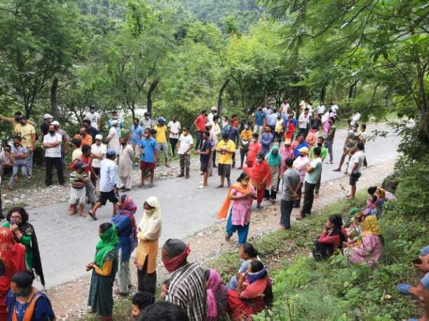 People came on the road to stop the mining in the river.