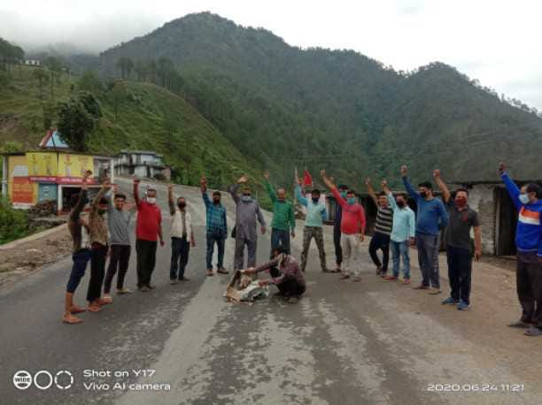 Villagers burnt effigy of Energy Corporation in Dhaun town