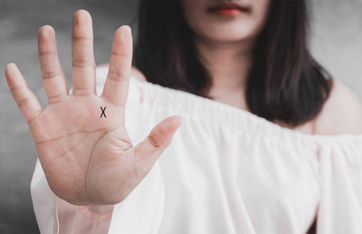 x sign on hands