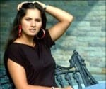 sania-bethanie move to 2nd round of madrid   open