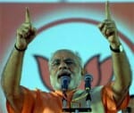 modi wins gujarat eyes turn to new delhi