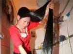 Chinese woman hasn't cut her 6ft 7in hair in 11 years