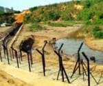 traffickers bringing drugs hidden in the grass